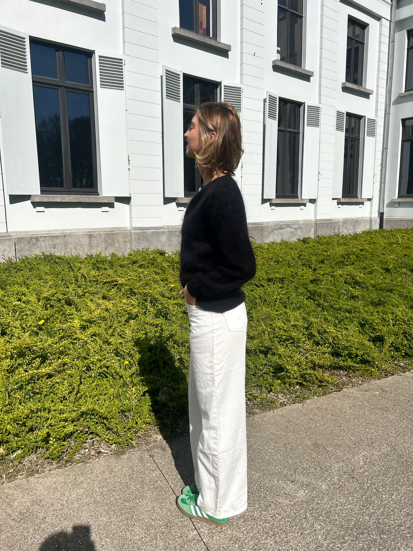 White jeans with cross