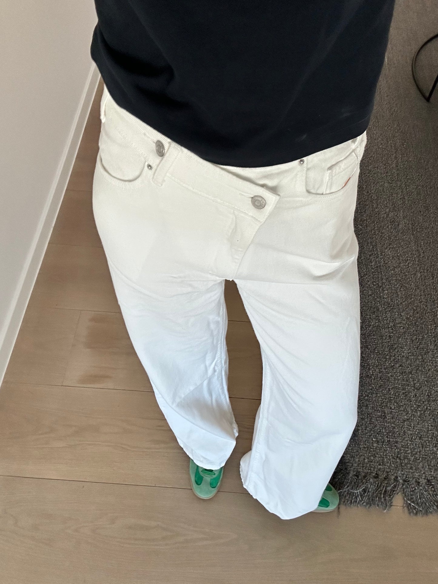 White jeans with cross